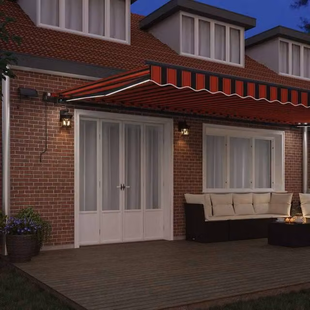 Berkfield Home Manual Retractable Folding Arm Awning with LED, Orange and Brown Striped Polyester, W: 600 cm, D: 300 cm