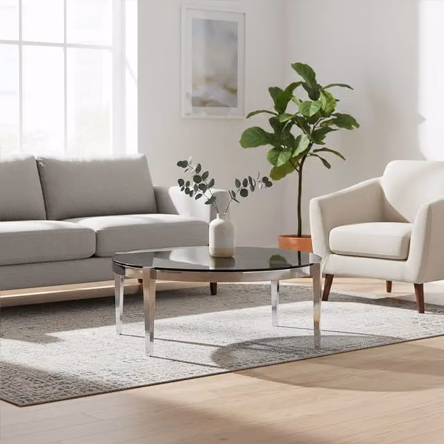 Orsina Round Coffee Table with Smoky Grey Glass Top and Silver Stainless Steel Frame, W/D/H: 110 x 40 x 31 cm