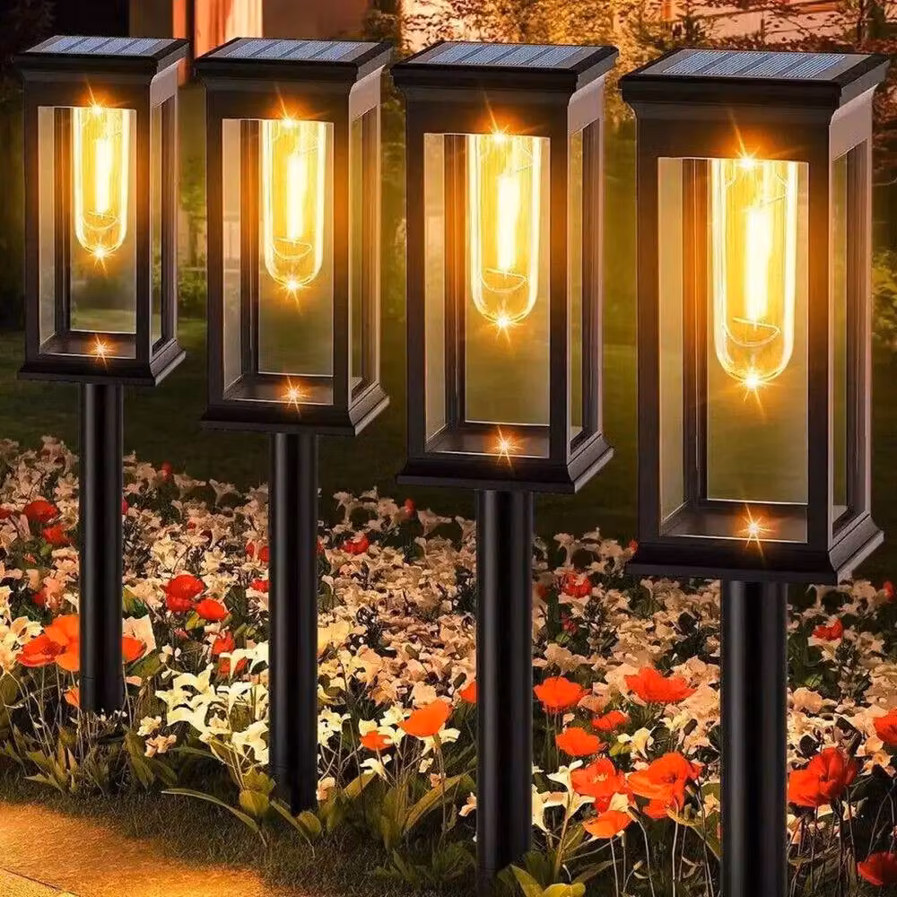 KORVIXA 2-Piece Set of Black Solar LED Garden Lights with Warm White Candle Effect – 5