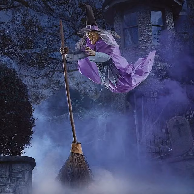 Home Accents Holiday 12ft Giant Animated Hovering Halloween Witch with Broomstick and LEDs in Black and Purple