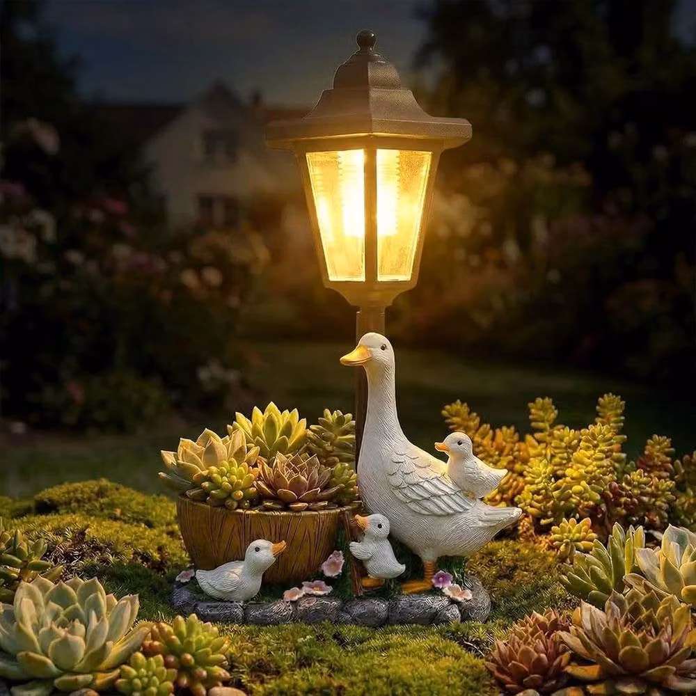 NESTLUNE Solar Duck Garden Statues with LED Lantern Flowerpot in White and Multicolour – 3