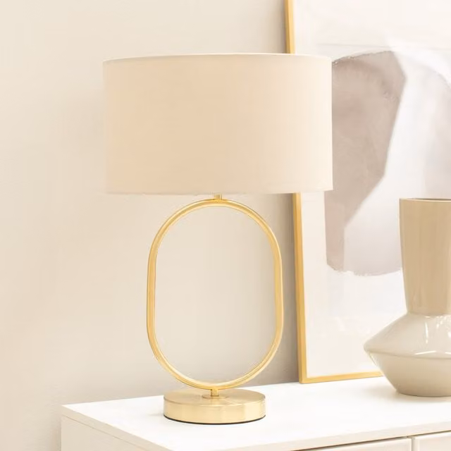 Antonia Brushed Gold Oval Table Lamp with Natural Fabric Drum Shade