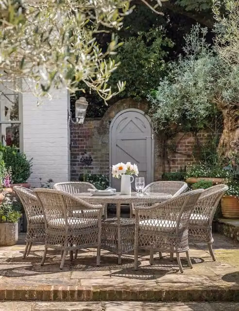 Gallery Direct Menton 6 Seater Round Polyrattan Garden Table and Chairs Set in Light Grey