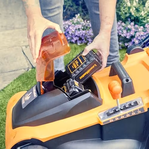 LawnMaster MX 24V Orange Cordless Lawnmower with 41cm Cutting Width, Spare Battery, Collection Bag and Mulching Kit – 5