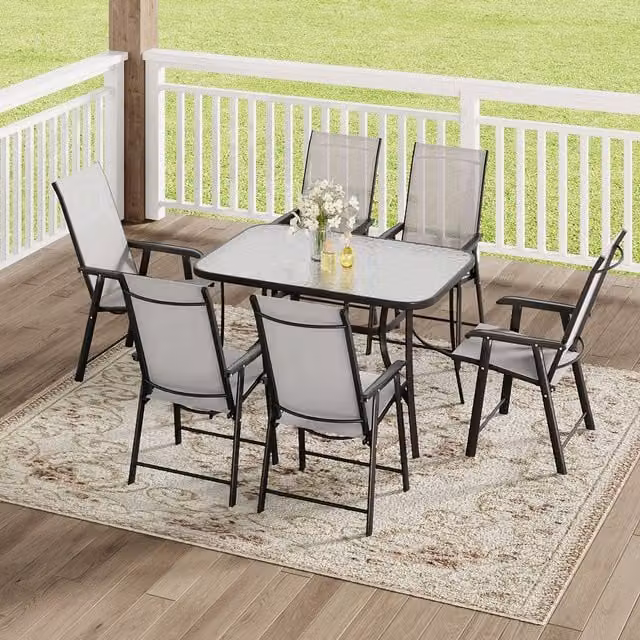 Komore 6 Seater Modern Patio Set with Black Glass Table and Grey Foldable Chairs, Table Width: 120 cm