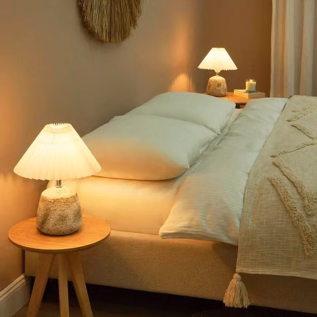 Wyld and Coco Pair of White and Grey Ceramic Table Lamps with White Pleated Shades