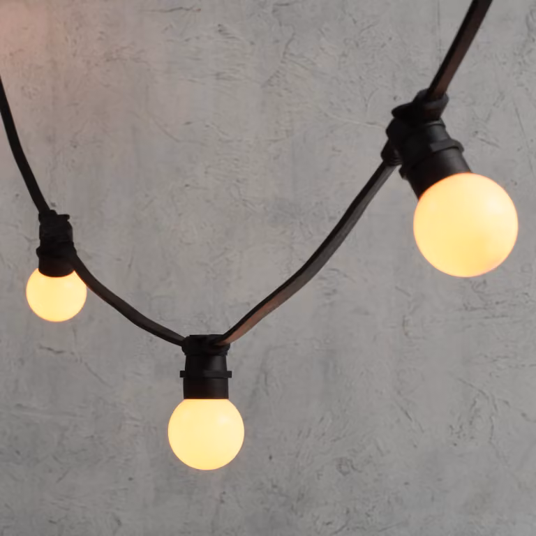 Plus Connect 10m Connectable LED Festoon Lights with 20 Warm White G60 Frosted Bulbs and Black Cable