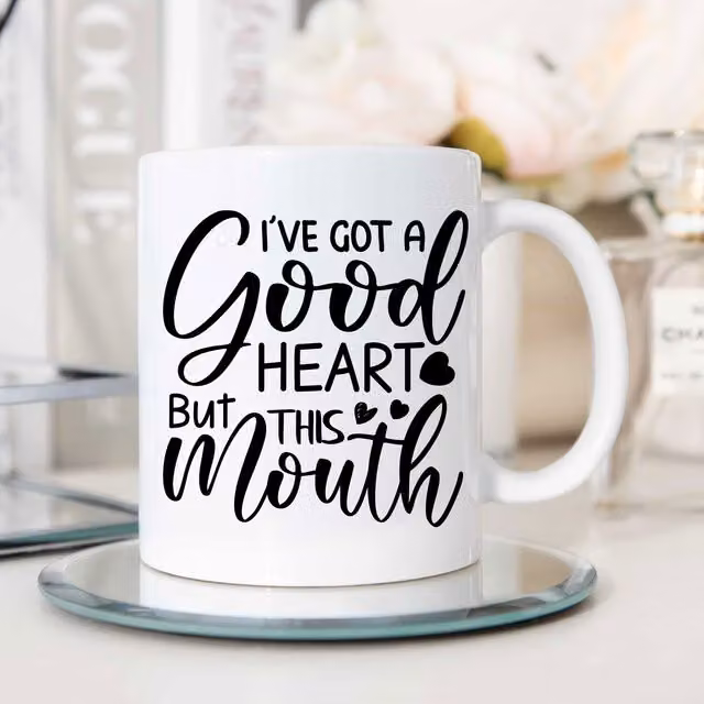 60 Second Makeover Limited I've Got A Good Heart But This Mouth Ceramic Mug in White
