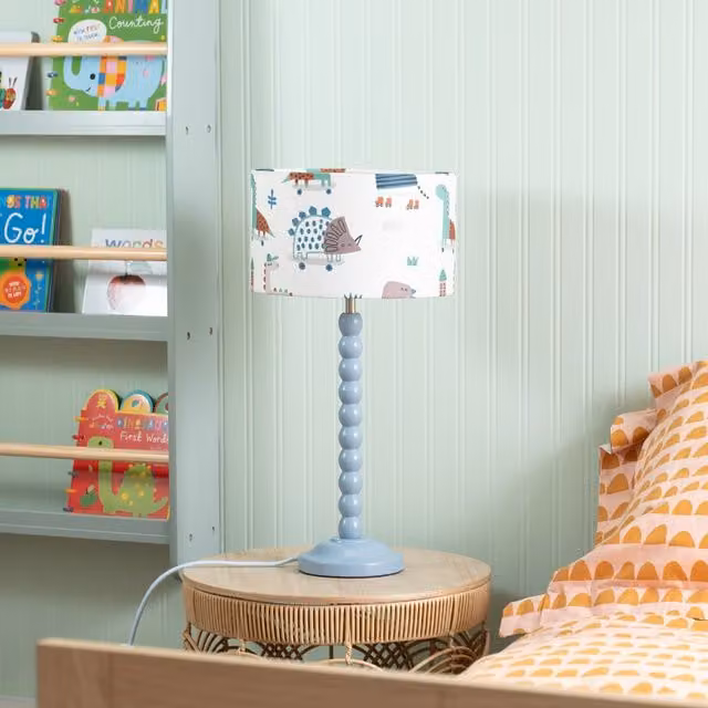ValueLights Blue Bobbin Stem Table Lamp with Cartoon Dino Drum Shade and LED Bulb