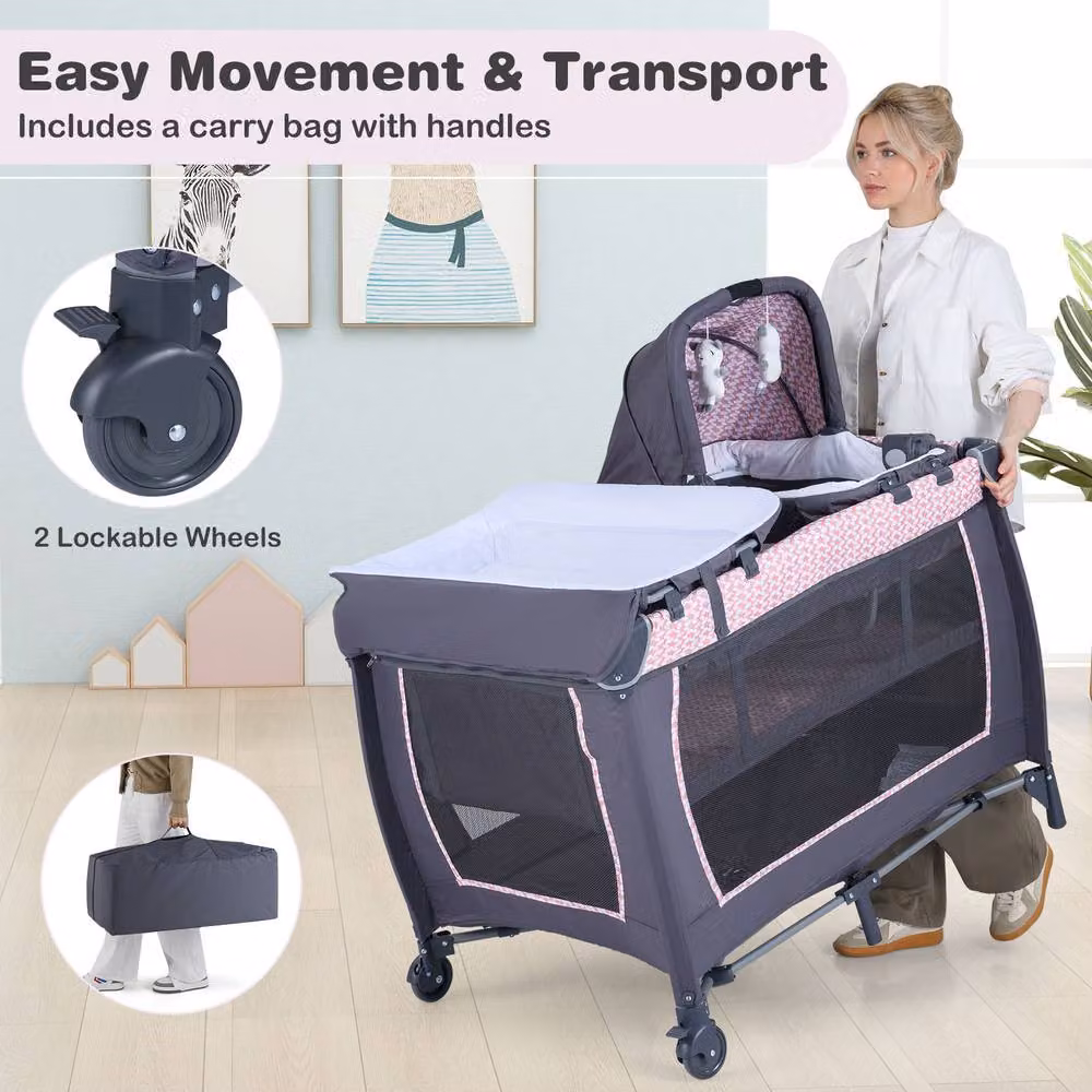 Costway Foldable Pack and Play Portable Baby Playard with Rocking Bassinet and Music Box in Pink – 8