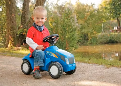 Rolly Toys New Holland Minitrac T6010 Ride-on Tractor with Squeaky Horn and Opening Bonnet, Blue – 2