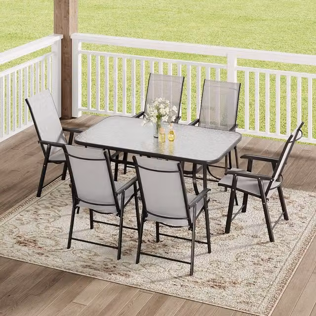 Komore 6 Seater Black Patio Set with 150 cm Glass Table and 6 Foldable Chairs